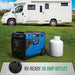 DuroMax 7,000 Watt Portable Dual Fuel Inverter Generator w/ CO Alert on grass with propane