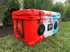 Gridiron Outdoor 68QT Speaker Cooler on grass mixed color